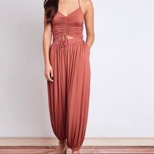 Wishlist, burnt orange jumpsuit. Size small, worn only once.